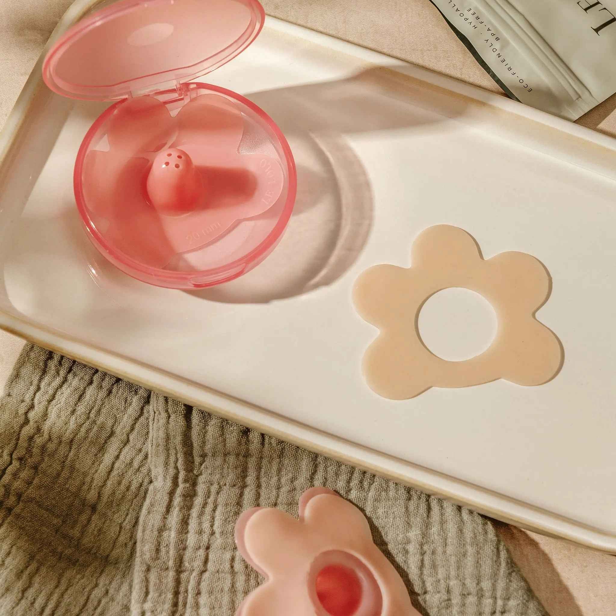 Le Lolo nipple shield and nipple shield sticker for breastfeeding moms