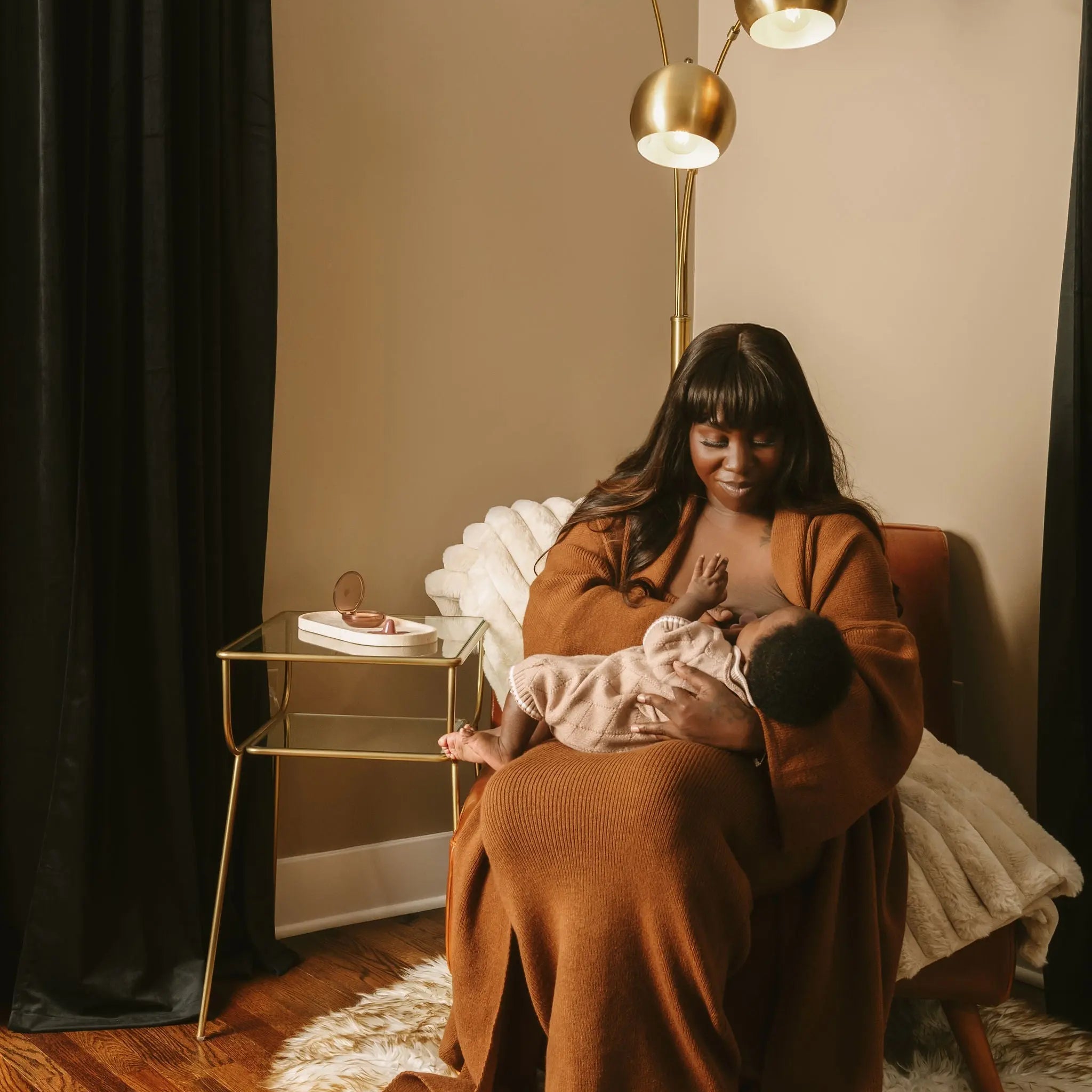 breastfeeding mom using a nipple shield