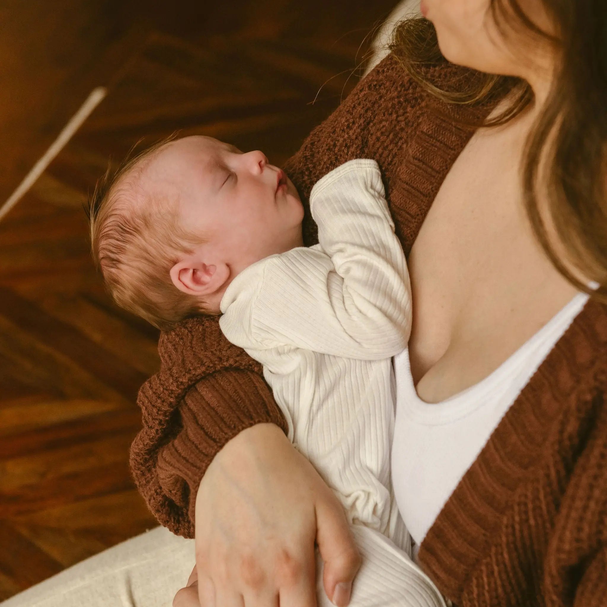 new mom holding newborn baby