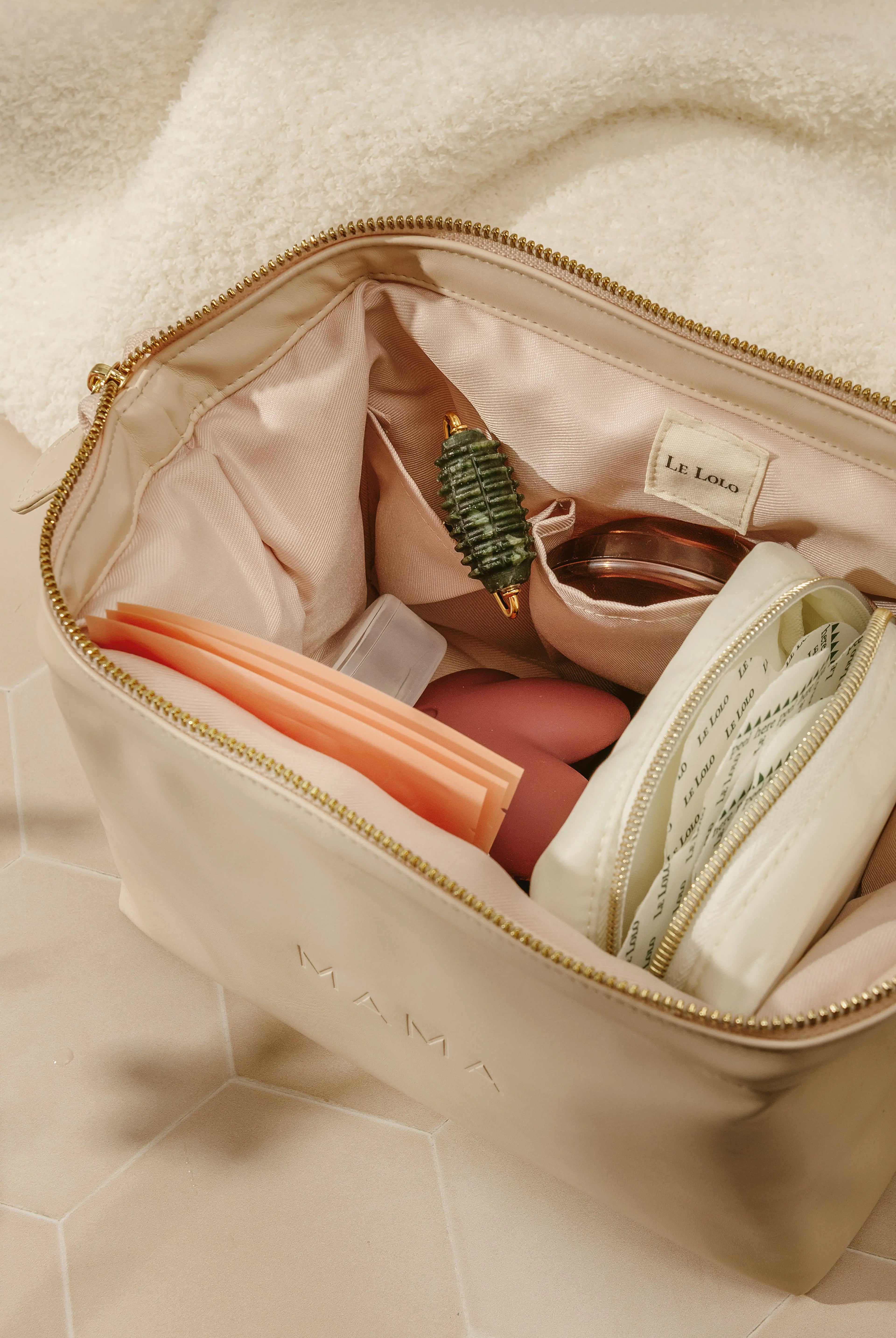 Leather mama carrying bag – waterproof diaper pouch and baby essentials organizer for new moms by Le Lolo