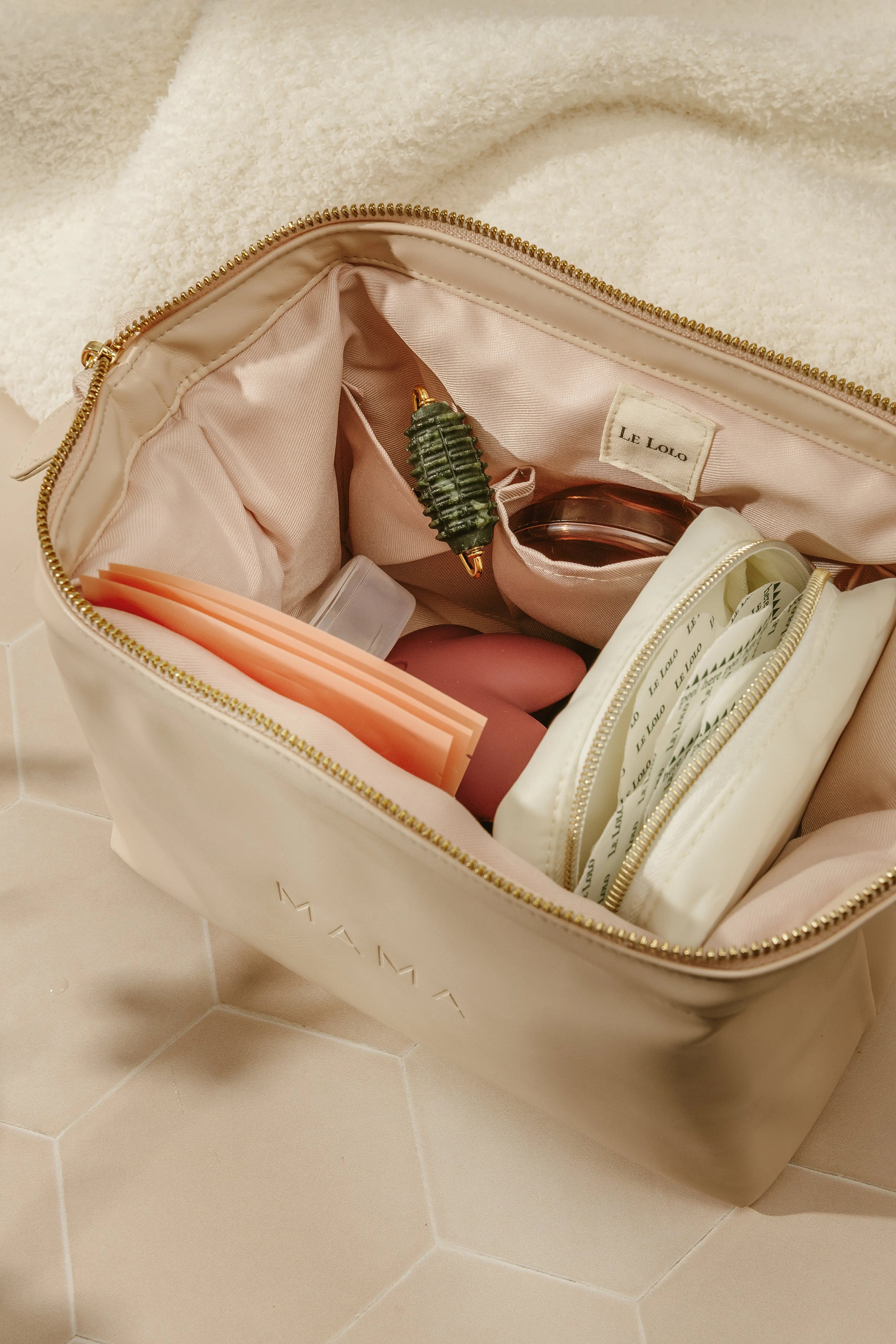 Leather mama carrying bag – waterproof diaper pouch and baby essentials organizer for new moms by Le Lolo