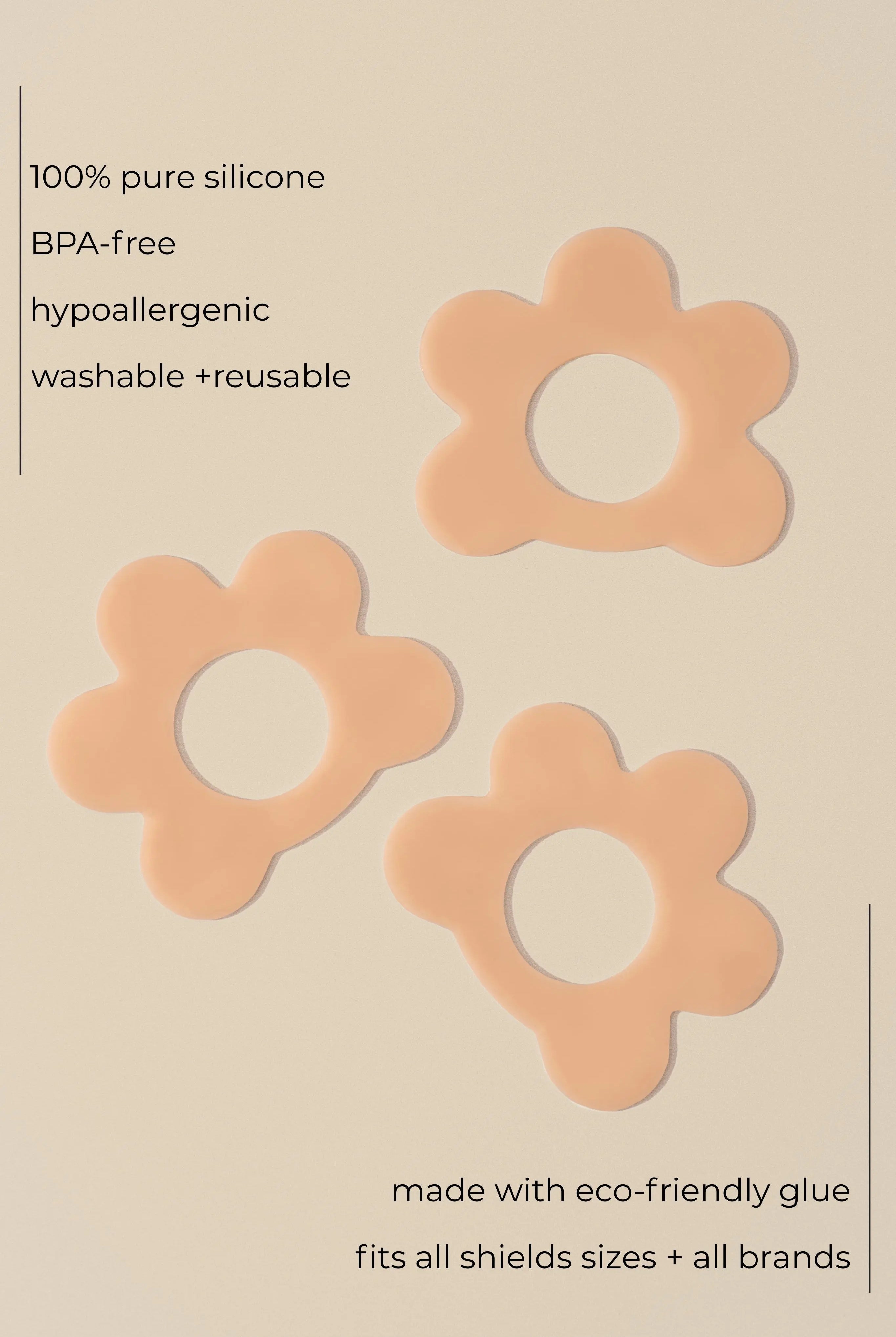 Reusable sticker tabs for securing nipple shields during feed