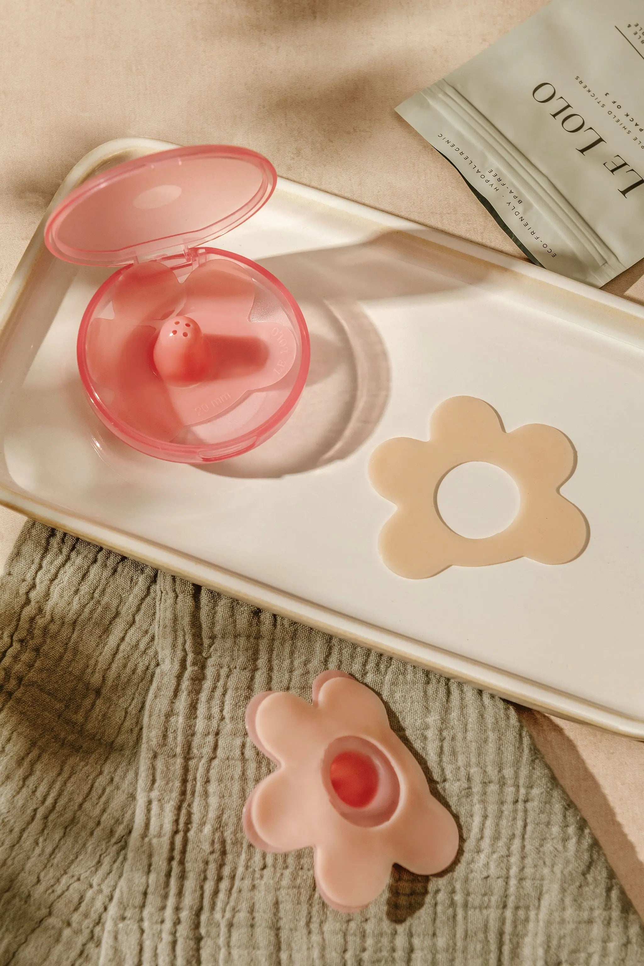 Washable nipple shield and adhesive stickers for new moms