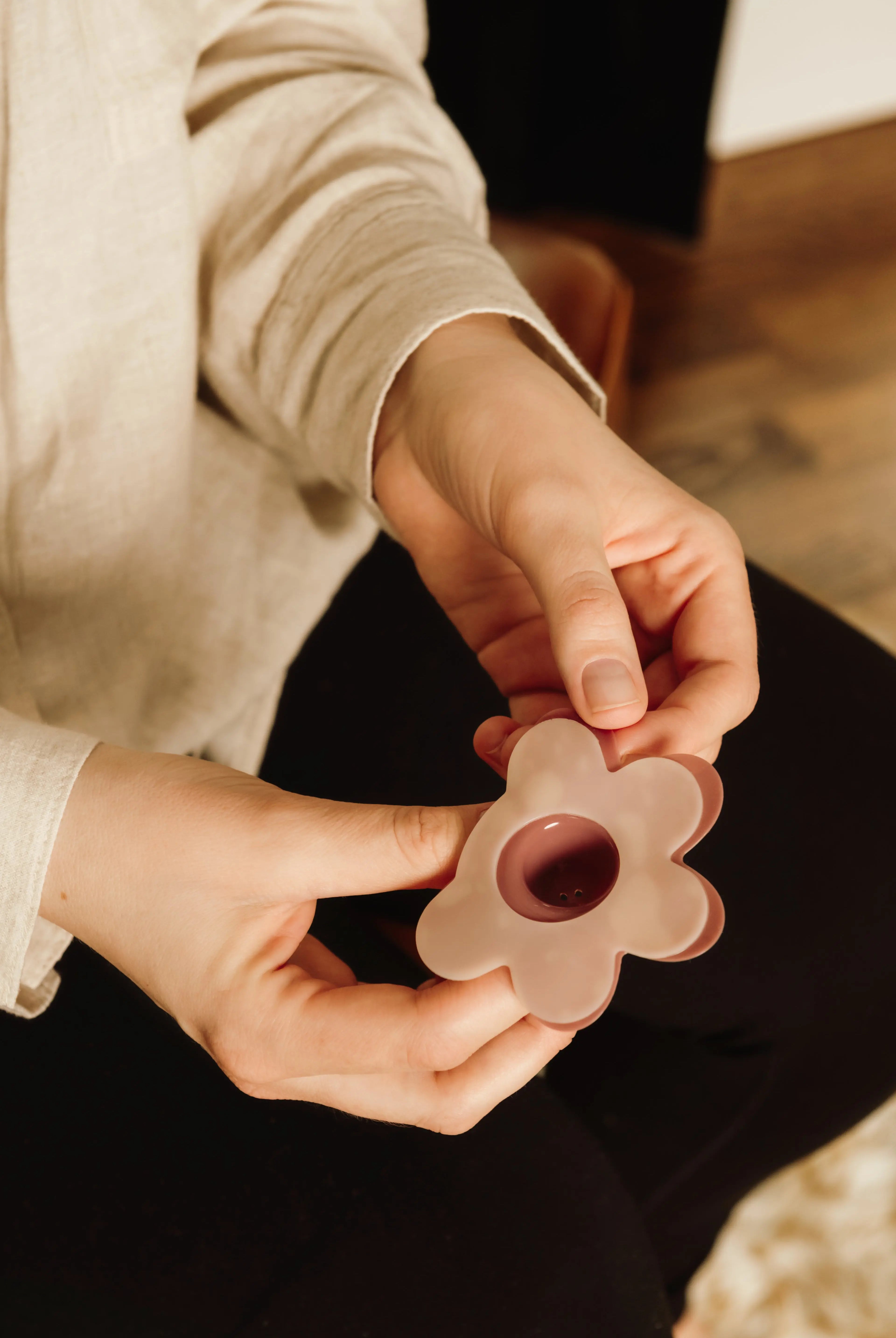 Nipple shield adhesive that prevents slipping while nursing