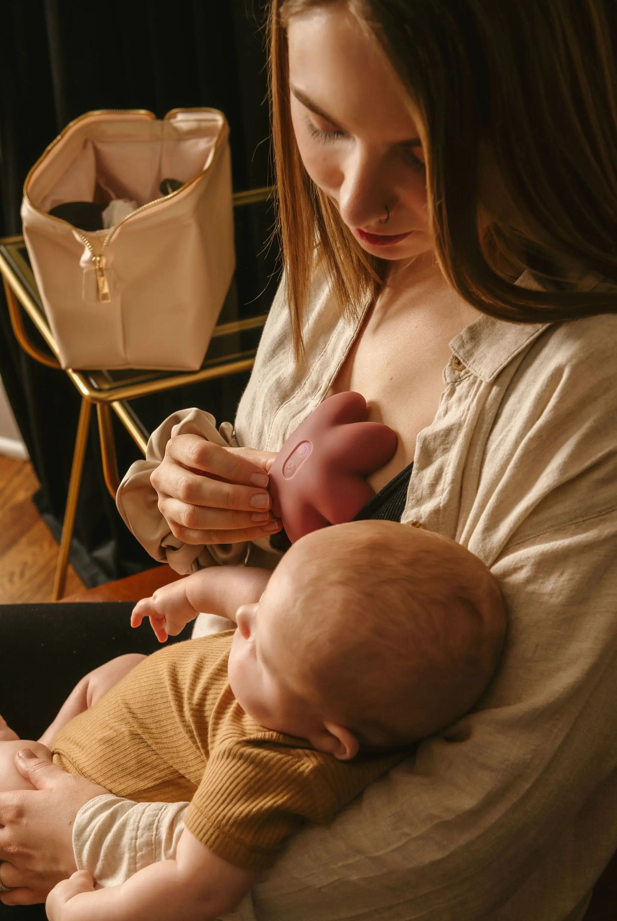 Tool for stimulating milk flow during breastfeeding