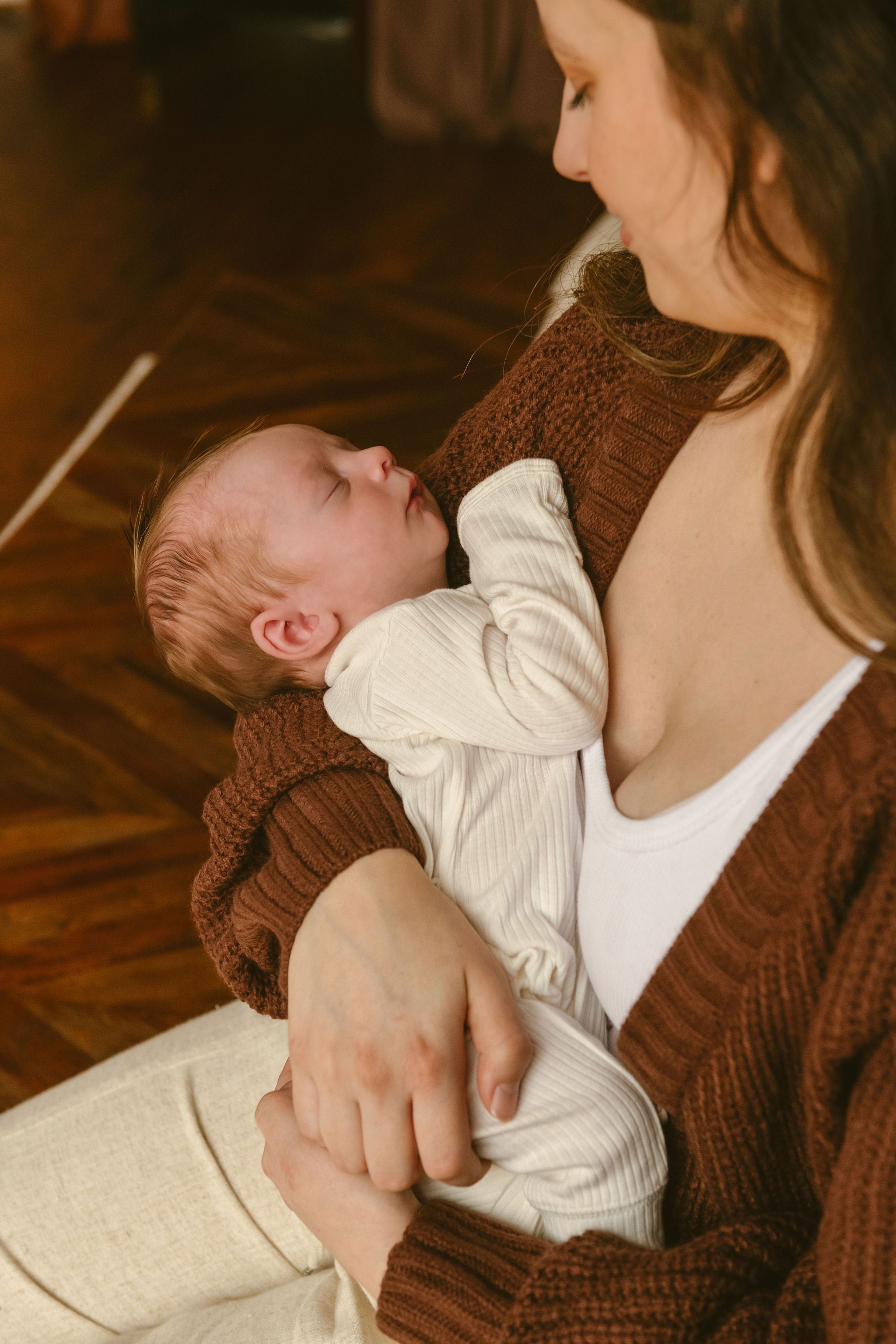 new mom holding newborn baby