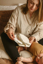 Lightweight disposable breast pads for breastfeeding