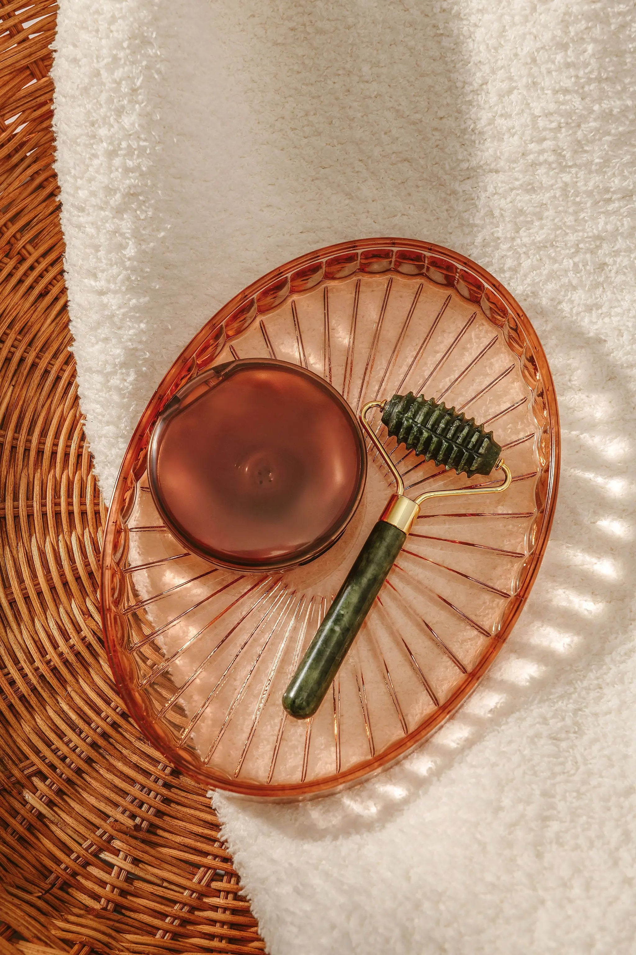 Green jade breastfeeding massager and easy-open case that keeps nipple shields organized