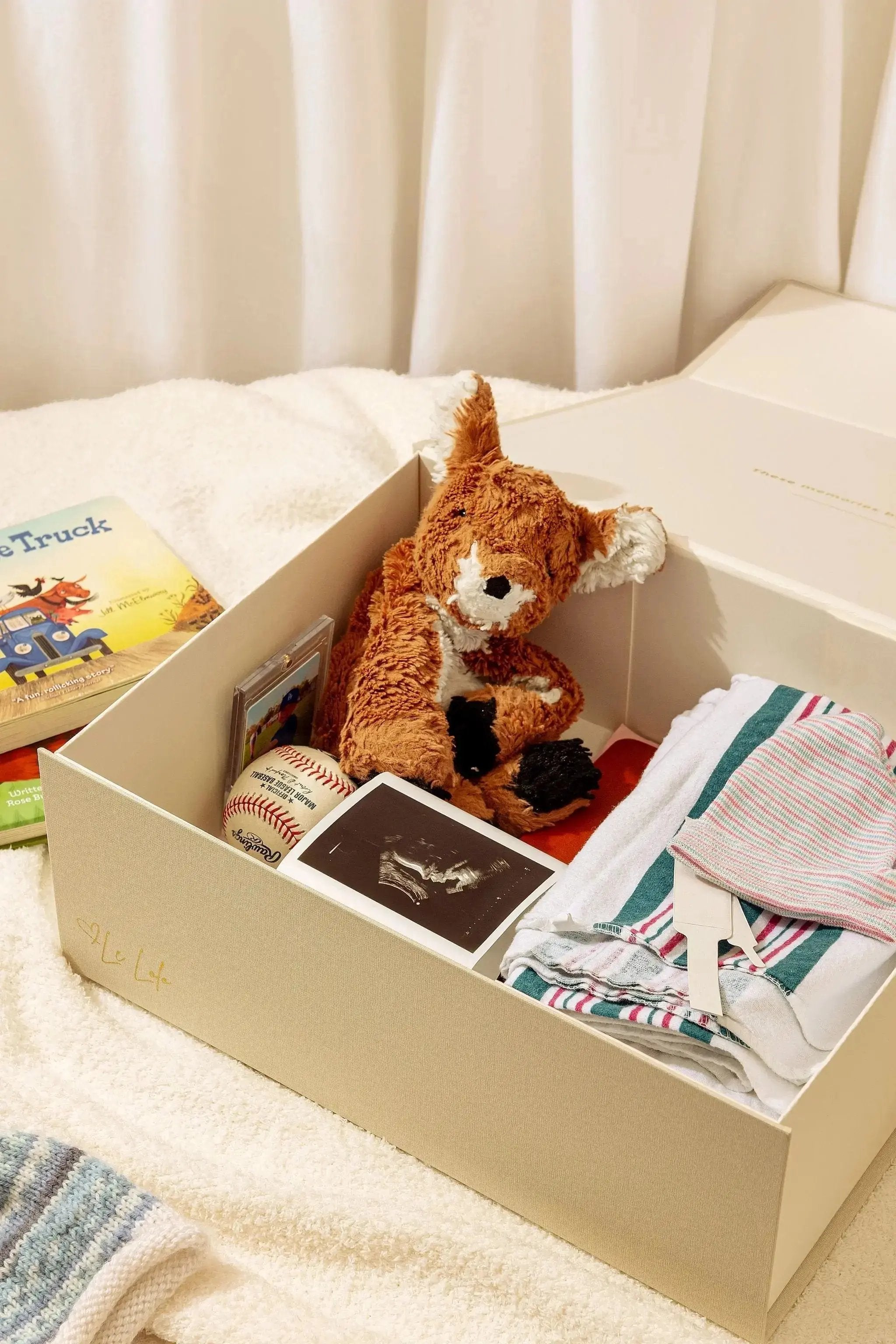 New mom gift box with breastfeeding and postpartum essentials
