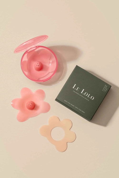 Soft silicone nipple shield with a cut out for skin to skin contact