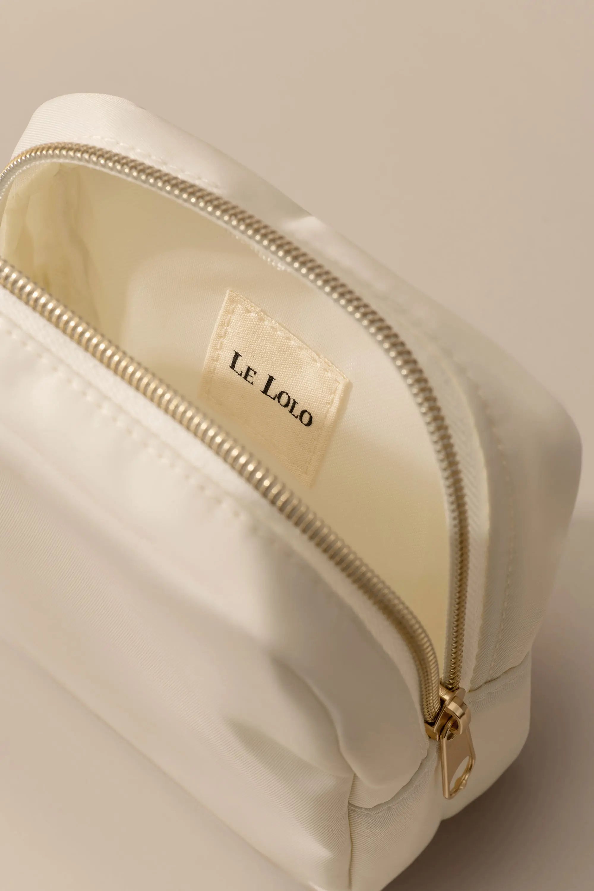 cream waterproof pouch for organizing postpartum essentials